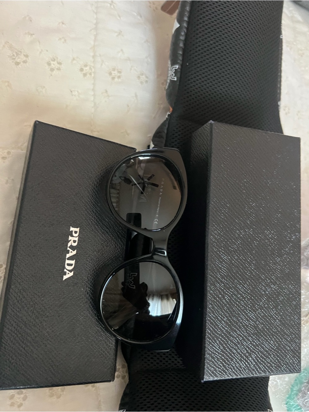 Prada Glossy Black Round Sunglasses